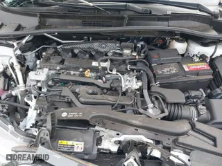 2022 Toyota Corolla Cross XLE with VIN 7MUDAAAG4NV005924, listed as a IAAI auction lot 41285454 with 15,570 mi miles. Bid and sale history available at carsss.com. Image 10.