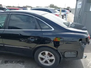 2006 Hyundai Azera SE with VIN KMHFC46F06A113482, listed as a IAAI auction lot 41733834 with 242,159 mi miles and . Bid and sale history available at DreamBid. Image 13.