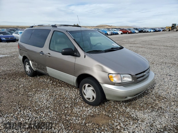 1999 Toyota Sienna LE with VIN 4T3ZF13C7XU133135, listed as a Copart auction lot 80618034 with 200,910 mi miles and Salvage Title. Bid and sale history available at carsss.com. Image 4.