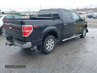 2013 Ford F-150 XL with VIN 1FTFW1ETXDFD72322, listed as a IAAI auction lot 41957807 with 312,909 mi miles. Bid and sale history available at carsss.com. Image 4.