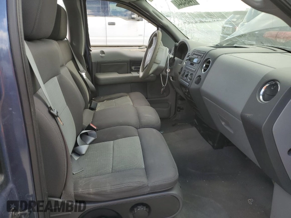 2004 Ford F-150 XL with VIN 1FTPF12584NC32561, listed as a Copart auction lot 74464844 with 250,379 mi miles and Salvage title. Bid and sale history available at DreamBid. Image 7.
