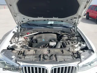 2015 BMW X4 xDrive28i with VIN 5UXXW3C53F0M88714, listed as a IAAI auction lot 41483692 with 132,054 mi miles. Bid and sale history available at carsss.com. Image 10.