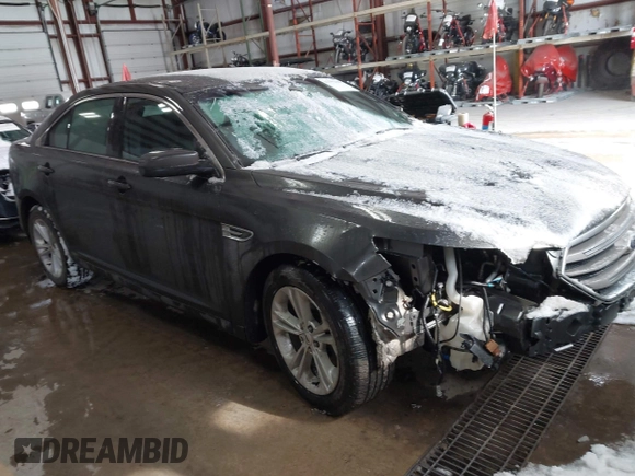 2015 Ford Taurus SEL with VIN 1FAHP2E89FG202589, listed as a IAAI auction lot 41592298 with 105,410 mi miles and . Bid and sale history available at carsss.com. Image 1.