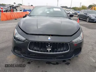 2015 Maserati Ghibli z VIN ZAM57XSA4F1151843, wystawiony jako IAAI lot #38392898 z przebiegiem 88 147 mil mil oraz . Historia ofert i sprzedaży dostępna na DreamBid. Obrazek 12.