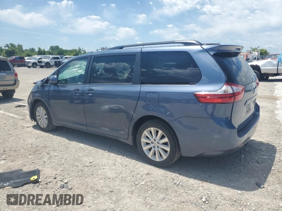 2015 Toyota Sienna LE with VIN 5TDJK3DC4FS107711, listed as a Copart auction lot 57693005 with 141,370 mi miles and Salvage title. Bid and sale history available at DreamBid. Image 2.