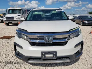 2020 Honda Pilot Touring 7-Passenger with VIN 5FNYF6H69LB018905, listed as a Copart auction lot 61209685 with 61,637 mi miles and Salvage title. Bid and sale history available at DreamBid. Image 5.