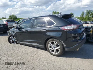 2015 Ford Edge Titanium z VIN 2FMTK4K88FBB56310, wystawiony jako Copart lot #53851524 z przebiegiem 170 380 mil mil oraz Szkody całkowita. Historia ofert i sprzedaży dostępna na DreamBid. Obrazek 2.