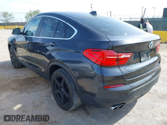 2015 BMW X4 xDrive28i z VIN 5UXXW3C54F0M87412, wystawiony jako IAAI lot #42038938 z przebiegiem 106 461 mil mil oraz . Historia ofert i sprzedaży dostępna na DreamBid. Obrazek 3.