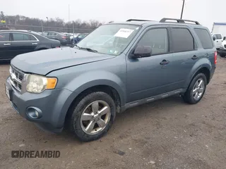 2010 Ford Escape XLT with VIN 1FMCU9D77AKD37005, listed as a IAAI auction lot 41948357 with 305,650 mi miles. Bid and sale history available at carsss.com. Image 2.