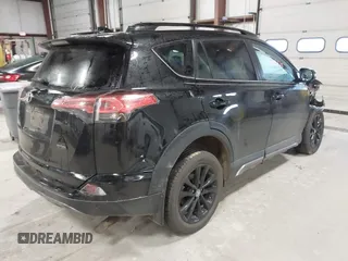 2018 Toyota RAV4 XLE with VIN 2T3RFREV0JW715761, listed as a IAAI auction lot 41881863 with 67,534 mi miles and . Bid and sale history available at DreamBid. Image 4.