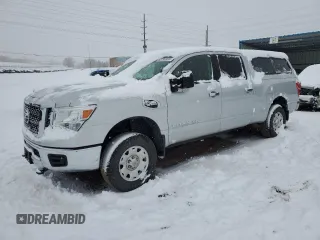 2017 Nissan Titan XD SV with VIN 1N6BA1F34HN525863, listed as a Copart auction lot 83799924 with 33,112 mi miles and Salvage Title. Bid and sale history available at carsss.com. Image 1.