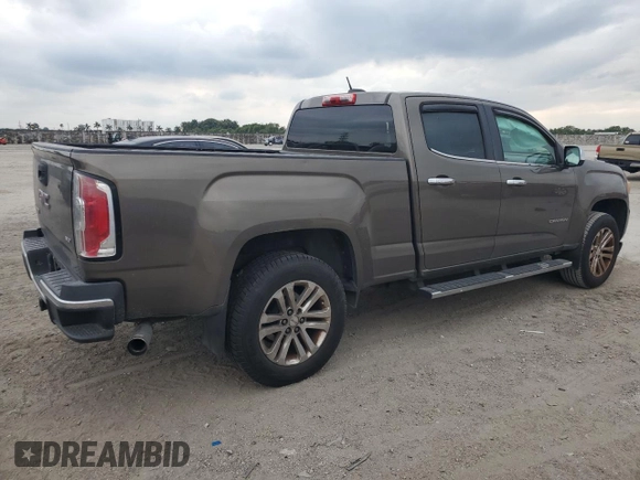2015 GMC Canyon 2WD SLT with VIN 1GTG5CE31F1118775, listed as a Copart auction lot 45272905 with 119,639 mi miles and Salvage Title. Bid and sale history available at carsss.com. Image 3.