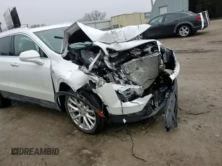 2021 Cadillac XT4 FWD Luxury z VIN 1GYAZAR48MF018135, wystawiony jako Copart lot #43023665 z przebiegiem 54 271 mil mil oraz Szkoda całkowita • Salvage title. Historia ofert i sprzedaży dostępna na DreamBid. Obrazek 12.