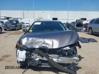 2023 Toyota Camry SE z VIN 4T1G11AK3PU735202, wystawiony jako IAAI lot #41874542 z przebiegiem 54 708 mil mil oraz . Historia ofert i sprzedaży dostępna na DreamBid. Obrazek 13.