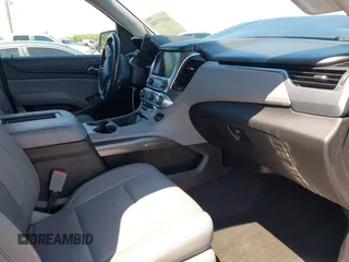 2018 Chevrolet Tahoe LT with VIN 1GNSCBKC0JR138385, listed as a IAAI auction lot 41977300 with 104,987 mi miles and . Bid and sale history available at DreamBid. Image 5.