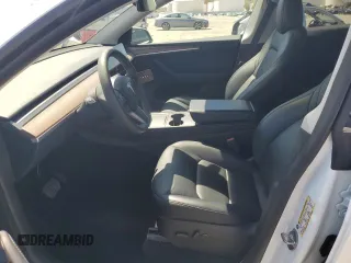 2024 Tesla Model Y Long Range с VIN 7SAYGDEE6RF157415, выставлен на аукционе Copart как лот 54950915 с пробегом 20 567 миль миль и Списание • Salvage title. История ставок и продаж доступна на DreamBid. Изображение 7.