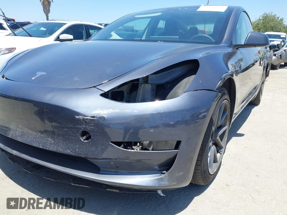2023 Tesla Model 3 with VIN 5YJ3E1EA1PF545402, listed as a IAAI auction lot 42671354 with 37,948 mi miles and . Bid and sale history available at DreamBid. Image 6.