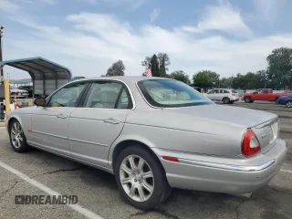 2004 Jaguar XJ Vanden Plas with VIN SAJWA74C04SG25291, listed as a Copart auction lot 56678255 with 176,597 mi miles and Clean Title. Bid and sale history available at DreamBid. Image 2.