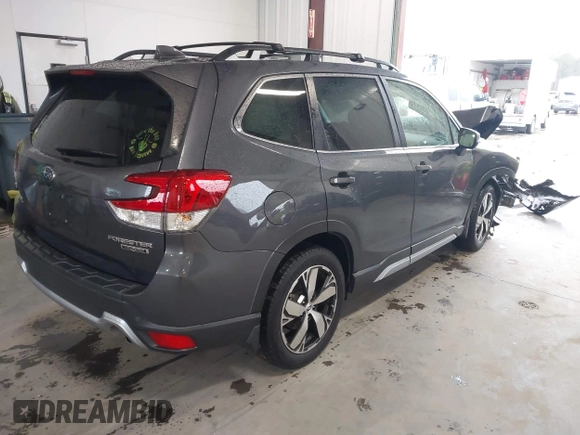 2021 Subaru Forester Touring with VIN JF2SKAXC8MH500831, listed as a IAAI auction lot 41564481 with 56,403 mi miles and . Bid and sale history available at DreamBid. Image 4.