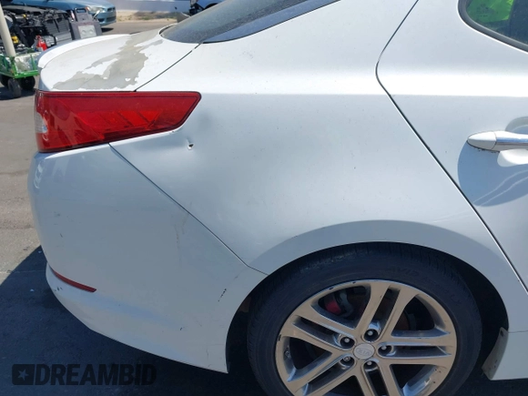 2013 Kia Optima SX with VIN 5XXGR4A64DG239506, listed as a IAAI auction lot 42406234 with 158,626 mi miles and . Bid and sale history available at DreamBid. Image 14.