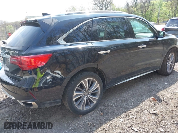 2018 Acura MDX Technology with VIN 5J8YD4H59JL005102, listed as a IAAI auction lot 42155562 with 71,890 mi miles and . Bid and sale history available at DreamBid. Image 4.