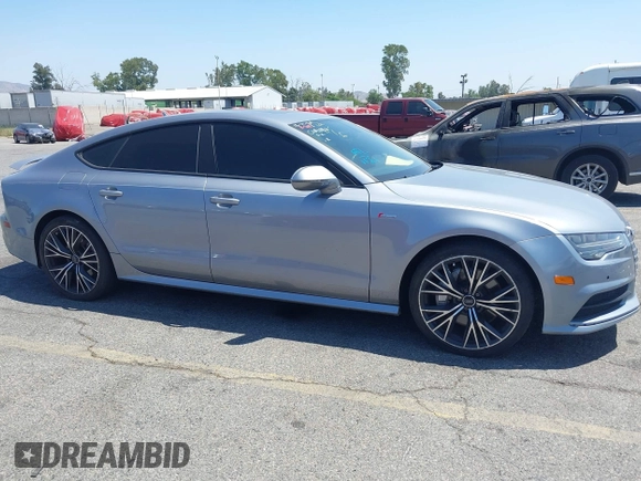 2018 Audi A7 Premium Plus z VIN WAUW3AFC1JN026763, wystawiony jako IAAI lot #42359297 z przebiegiem 108 937 mil mil oraz . Historia ofert i sprzedaży dostępna na DreamBid. Obrazek 1.