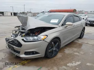 2016 Ford Fusion Titanium Hybrid with VIN 3FA6P0RU9GR143203, listed as a IAAI auction lot 41332144 with 94,357 mi miles. Bid and sale history available at carsss.com. Image 2.