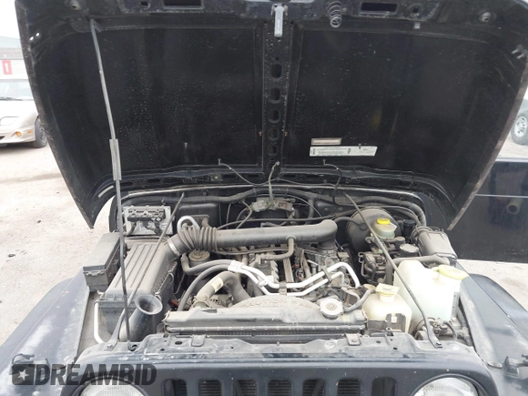 2000 Jeep Wrangler Sahara with VIN 1J4FA59S7YP805628, listed as a IAAI auction lot 42259201 with Not provided miles and . Bid and sale history available at DreamBid. Image 10.