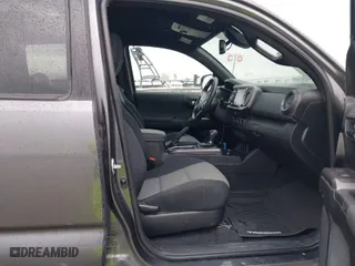 2021 Toyota Tacoma 2WD SR5 with VIN 5TFAZ5CNXMX097509, listed as a IAAI auction lot 41889399 with 81,598 mi miles. Bid and sale history available at carsss.com. Image 5.