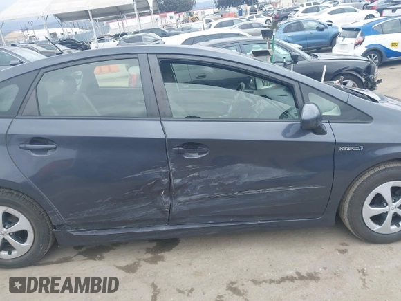 2013 Toyota Prius One z VIN JTDKN3DU4D5677392, wystawiony jako IAAI lot #42050842 z przebiegiem 169 732 mil mil oraz . Historia ofert i sprzedaży dostępna na DreamBid. Obrazek 13.