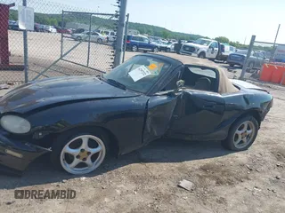 1999 Mazda MX-5 Miata with VIN JM1NB3539X0112181, listed as a IAAI auction lot 42397232 with 11 mi miles and . Bid and sale history available at DreamBid. Image 14.