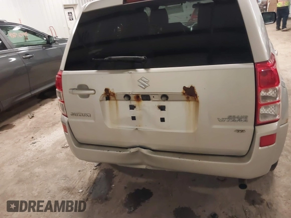 2012 Suzuki Grand Vitara Premium z VIN JS3TD0D62C4100440, wystawiony jako IAAI lot #41711815 z przebiegiem 171 527 mil mil oraz . Historia ofert i sprzedaży dostępna na DreamBid. Obrazek 6.