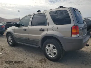 2001 Ford Escape XLT with VIN 1FMCU03131KB27591, listed as a Copart auction lot 66605904 with 167,094 mi miles and Salvage Title. Bid and sale history available at carsss.com. Image 2.