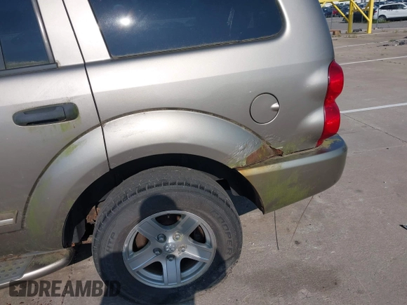 2004 Dodge Durango Limited z VIN 1D8HB58D64F100559, wystawiony jako IAAI lot #42369791 z przebiegiem 266 727 mil mil oraz . Historia ofert i sprzedaży dostępna na DreamBid. Obrazek 6.