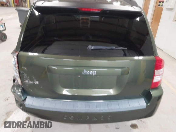 2008 Jeep Compass Sport with VIN 1J8FF47W28D534267, listed as a IAAI auction lot 42009243 with 122,720 mi miles and . Bid and sale history available at carsss.com. Image 16.