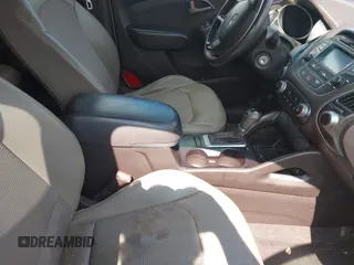 2015 Hyundai Tucson GLS with VIN KM8JT3AF6FU982128, listed as a IAAI auction lot 42227235 with 141,612 mi miles and . Bid and sale history available at DreamBid. Image 5.