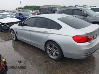2015 BMW 4 Series 428i with VIN WBA4A9C50FD416459, listed as a IAAI auction lot 42471985 with 160,089 mi miles and . Bid and sale history available at DreamBid. Image 3.