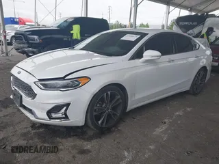 2019 Ford Fusion Titanium with VIN 3FA6P0K90KR236674, listed as a IAAI auction lot 42008633 with 99,737 mi miles and . Bid and sale history available at DreamBid. Image 17.