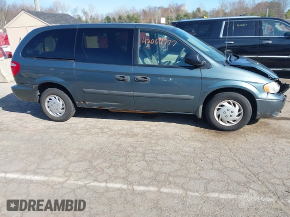 2006 Dodge Grand Caravan SE with VIN 1D4GP24R56B596611, listed as a IAAI auction lot 42057777 with 163,258 mi miles and . Bid and sale history available at DreamBid. Image 13.