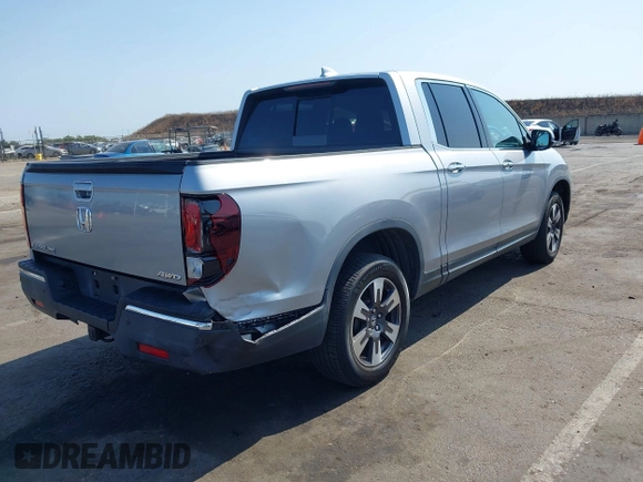 2019 Honda Ridgeline RTL-E with VIN 5FPYK3F79KB029771, listed as a IAAI auction lot 42448369 with 90,142 mi miles and . Bid and sale history available at DreamBid. Image 4.