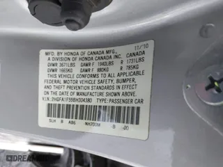 2011 Honda Civic Sdn LX with VIN 2HGFA1F59BH304380, listed as a IAAI auction lot 41936278 with 223,973 mi miles. Bid and sale history available at carsss.com. Image 9.
