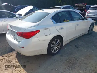 2015 Infiniti Q50 Premium z VIN JN1BV7AP5FM333958, wystawiony jako IAAI lot #42351044 z przebiegiem 158 428 mil mil oraz . Historia ofert i sprzedaży dostępna na DreamBid. Obrazek 4.
