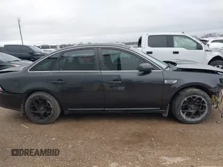 2008 Ford Taurus SEL with VIN 1FAHP24W28G108122, listed as a IAAI auction lot 41546652 with 219,774 mi miles. Bid and sale history available at carsss.com. Image 13.