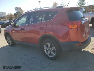 2015 Toyota RAV4 XLE with VIN JTMWFREV3FJ056079, listed as a Copart auction lot 82830964 with 208,357 mi miles and Salvage Title. Bid and sale history available at carsss.com. Image 2.