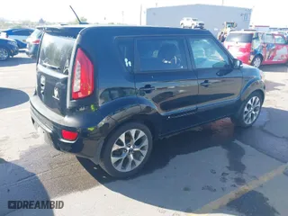 2013 Kia Soul + with VIN KNDJT2A62D7619416, listed as a IAAI auction lot 42046150 with 116,851 mi miles. Bid and sale history available at carsss.com. Image 4.
