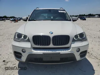2012 BMW X5 35i z VIN 5UXZV4C54CL990840, wystawiony jako Copart lot #57715245 z przebiegiem 166 192 mil mil oraz Szkoda całkowita • Salvage title. Historia ofert i sprzedaży dostępna na DreamBid. Obrazek 5.