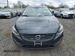 2016 Volvo S60 T5 Drive-E Premier z VIN YV126MFK9G2406956, wystawiony jako Copart lot #53336155 z przebiegiem 147 915 mil mil oraz Czysty tytuł • Clean title. Historia ofert i sprzedaży dostępna na DreamBid. Obrazek 5.
