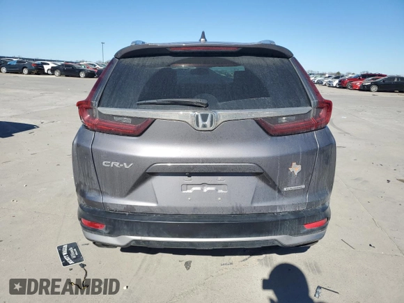 2020 Honda CR-V Touring z VIN 7FARW1H95LE002254, wystawiony jako Copart lot #42535505 z przebiegiem 77 004 mil mil oraz Szkoda całkowita • Salvage title. Historia ofert i sprzedaży dostępna na DreamBid. Obrazek 6.