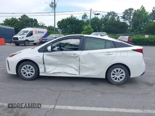 2019 Toyota Prius L Eco z VIN JTDKARFU3K3102222, wystawiony jako IAAI lot #42291403 z przebiegiem 27 669 mil mil oraz . Historia ofert i sprzedaży dostępna na DreamBid. Obrazek 13.
