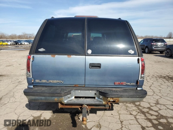 1997 GMC Suburban with VIN 1GKFK16R7VJ707618, listed as a Copart auction lot 49882035 with 317,771 mi miles and Salvage Title. Bid and sale history available at carsss.com. Image 6.